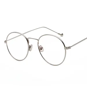 Montura de gafas redonda clásica de metal plateado con lentes de luz azul