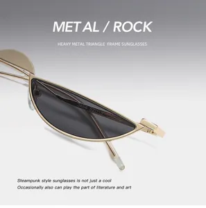 Gros plan de lunettes de soleil demi-cerclées triangulaires dorées au style steampunk