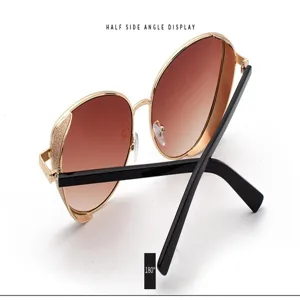 Detail view of women's sunglasses with golden glitter frame and brown gradient lenses