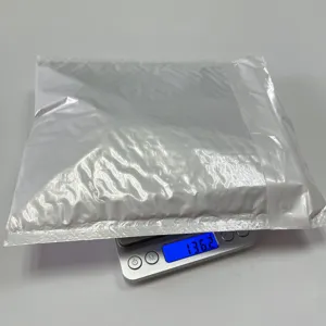 Detail view of the silver bubble mailer package weighing 136.2 grams for safe delivery reference.