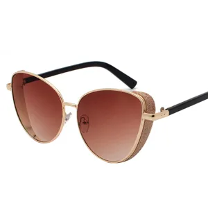 Elegant women's cat-eye sunglasses with glitter gold frames and brown gradient lenses
