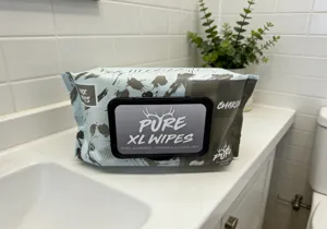 Detailed view of large pack flushable wet wipes in home bathroom setting, clean and fresh.