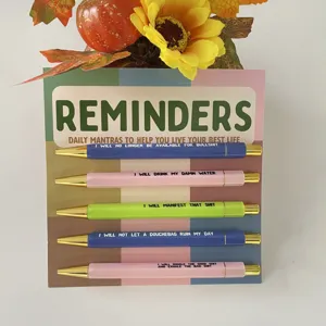 Set di penne a sfera retrattili con carta promemoria motivazionale per uso quotidiano.