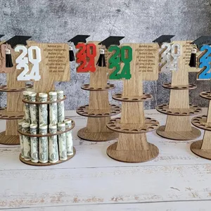Tiered wooden graduation money holder 2024 class of gift holder with multiple circular slots.