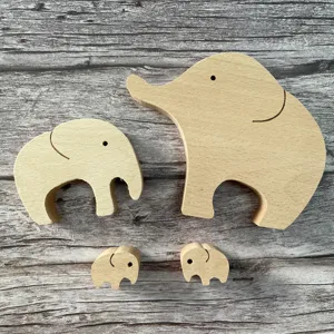 Detailed shot of cute wooden elephant family figurines set, natural wood texture decor.