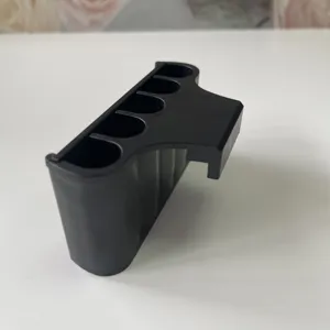 Black plastic aquarium plant holder with multiple holes for fish tank aquaponic decoration.