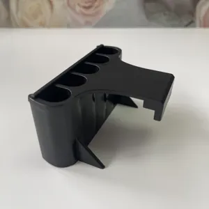 Aquarium plant holder detail view, black plastic hanging hydroponic pot for fish tank rim.