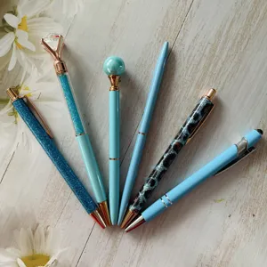 Set of 6 stylish blue ballpoint pens featuring crystal diamond top and glitter designs.