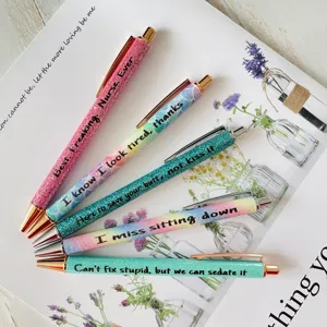 Funny glitter ballpoint pen set detail view, colorful nurse quote office stationery gift.