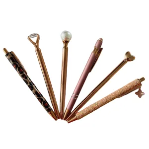 Set of 6 luxury rose gold ballpoint pens with diamond pearl and glitter details for office.