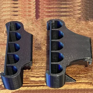 Detailed view of black 3D printed fish tank plant holder bracket featuring multi-hole design