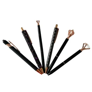 Detailed view of the 6-piece crystal diamond crown ballpoint pen set in sleek black.