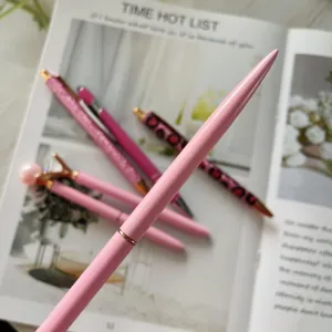 Detail view of pink rhinestone diamond ballpoint pen set, elegant retractable stationery.