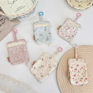 Floral print mini key pouch with double zippers and hanging ring, cute portable earphone storage bag.