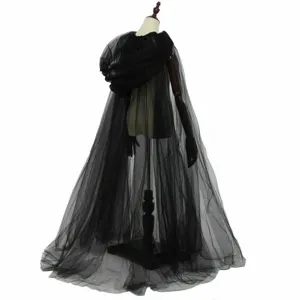 Detailed view of a long black tulle hooded cape, perfect for Halloween and vampire costumes.