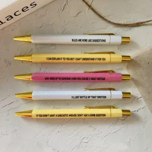 Set 5 penne a sfera con citazioni divertenti, fusti colorati con clip e punta in metallo.