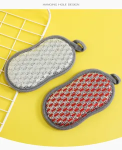 Double sided dishwashing sponge detail with hanging hole design and silver wire scrubbing pad.