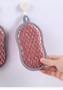 Silver wire dishwashing sponge detail view, double-sided kitchen cleaning scrubber.