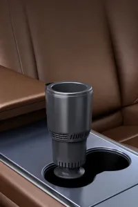 Detailed view of the smart car heating and cooling cup, compact design for various vehicle holders.