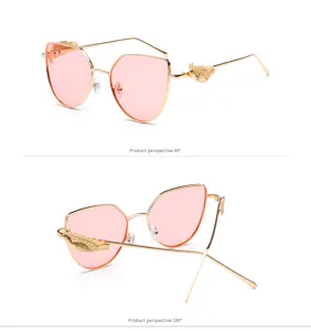 Detailed shots of retro sunglasses featuring gold wing relief and stylish pink ocean lenses
