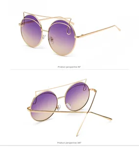 Detailed view of round sunglasses with purple gradient lenses and gold top wire frame.