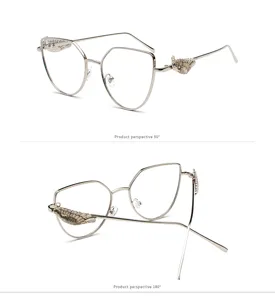 Detailed views of retro glasses with embossed silver wing decorations at 90 and 180 degrees
