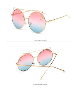 Detailed view of round sunglasses with cat ear design and pink-blue gradient lenses