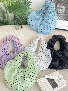 Elegantes bolsos de malla de organza con lunares y volantes en varios colores vibrantes