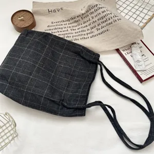 Retro dark gray checkered drawstring tote bag made of durable canvas material