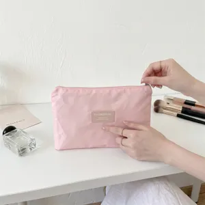 Draagbare roze nylon make-uptas met ritssluiting voor dagelijkse benodigdheden