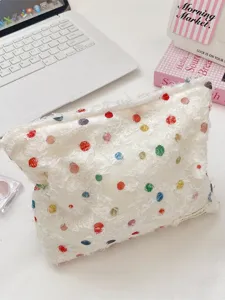 Koreaanse organza make-uptas met kleurrijke stippen en een unieke franje textuur.
