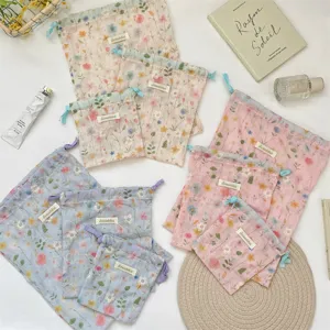 Floral embroidered drawstring organizer bags in multiple sizes for travel