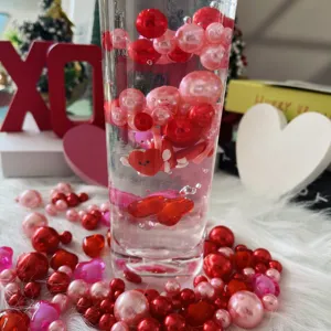 Valentine's day vase filler pink and red pearl beads with heart shapes for home decor.