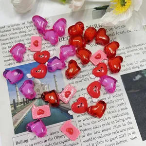 Detail shot of cute heart resin charms and vase fillers, perfect for DIY crafts and decor.