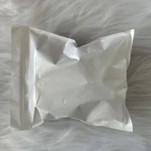White sealed packaging bag detail showcasing Christmas vase filler decoration supplies.
