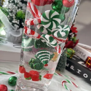 Christmas vase filler charms closeup, festive peppermint candy and tree decor details.