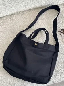 Bolso Tote de Lona Negra de Gran Capacidad Estilo Minimalista Relajado Correa Ancha para el Hombro Bolso Bandolera para Estudiantes Diario