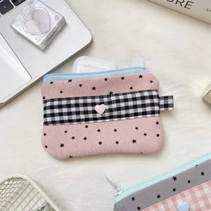 Pink star pattern and plaid fabric storage pouch with heart detail for stationery or earphones