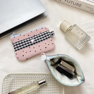 Interior view of the star-patterned pouch showing large capacity for makeup storage