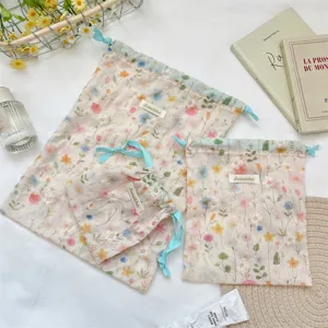 Lightweight floral drawstring storage bag set for travel organizing clothes and cosmetics