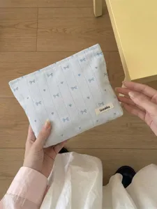 Blue bow and heart embroidery cosmetic bag for skincare and small items organization