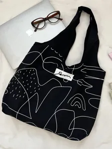 Schwarze Canvas-Tragetasche mit weißem abstrakten Linienkunstdruck für Alltag