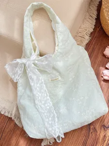 Elegant cream white cherry blossom embroidery tote bag with a decorative lace bow detail.
