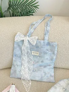 Large capacity ice blue tie-dye floral tote bag featuring a decorative white lace bow