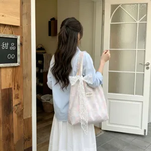 Korean style pink and blue checkered tote bag with large white lace bow detail for campus