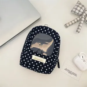 Polka dot doll storage pouch with a transparent window and pendant hook detail