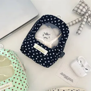 Polka dot doll storage pouch with a transparent window for display and Sozakka label