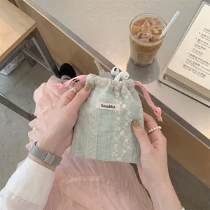 Floral embroidered mint green drawstring pouch storage bag for travel accessories