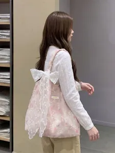 Girl's large capacity floral embroidered pink tote bag with an elegant white lace bow