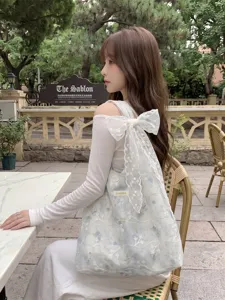 Floral embroidered tote bag with elegant lace bow detail for women